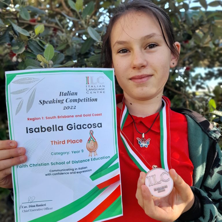 Isabella Giocosa holding her Bronze medal and certificate