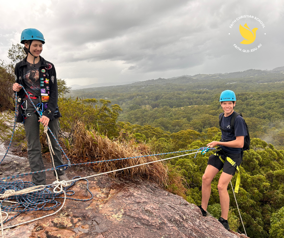 Students abseiling down a mountain at the Faith Christian School Adventure's Guide to Noosa Camp